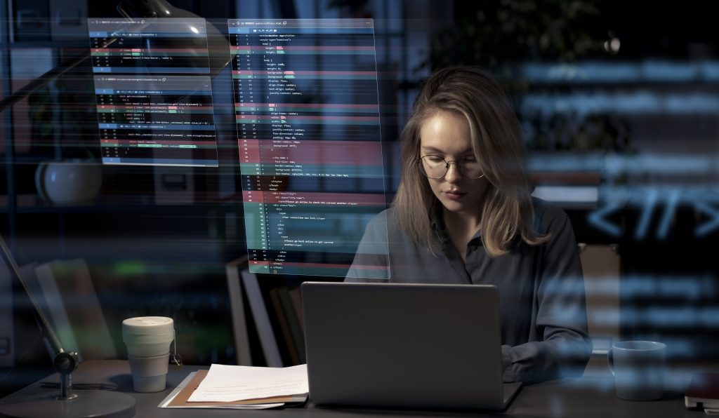 programming-background-with-person-working-with-codes-computer